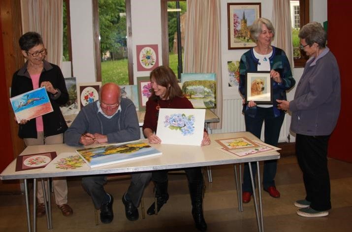 Members of Rotherham Society of Arts and Crafts showing their work