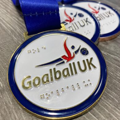 Rockingham Trophies develops braille medal for blind athletes